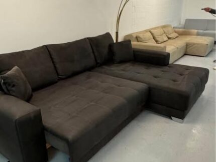 XXXLutz Ecksofa mit elektrischer Bettfunktion