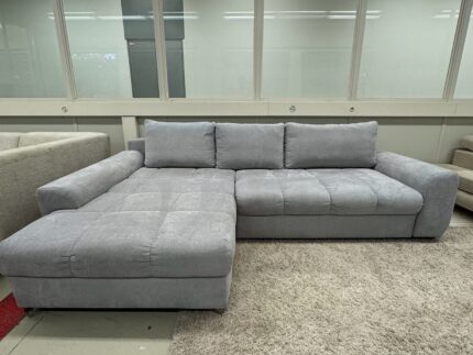 Leicht verschiebbares Ecksofa mit integrierten Rollen & Bettfunktion