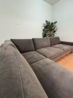 Elegantes Ecksofa mit waschbaren Kissenbezügen – Occasion Sofa kaufen bei SofaLab