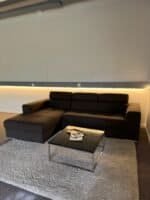 Corner Sofa with storage space and pull-out bed – Occasion sofa for sale at SofaLab