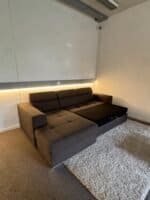 Corner Sofa with storage space and pull-out bed – Occasion sofa for sale at SofaLab