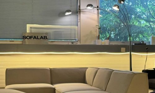 Modular sofa sand beige with footrest – Occasion sofa for sale at SofaLab