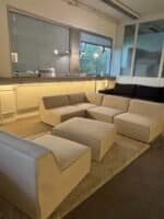 Modular sofa sand beige with footrest – Occasion sofa for sale at SofaLab
