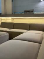 Modular sofa sand beige with footrest – Occasion sofa for sale at SofaLab