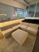 Modular sofa sand beige with footrest – Occasion sofa for sale at SofaLab