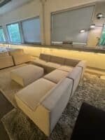 Modular sofa sand beige with footrest – Occasion sofa for sale at SofaLab
