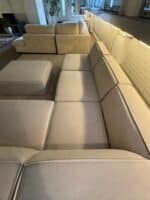 Modular sofa sand beige with footrest – Occasion sofa for sale at SofaLab