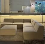 Modular sofa sand beige with footrest – Occasion sofa for sale at SofaLab