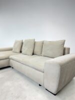 Beiges Corner Sofa With bed function and storage space