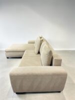 Beiges Corner Sofa With bed function and storage space