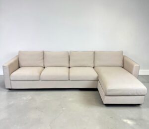 Corner Sofa made of beige fabric with removable pillows – buy Occasion sofa at SofaLab