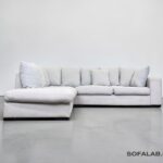 Corner Sofa made of light gray fabric, including all pillows – buy Occasion sofa at SofaLab