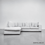 Corner Sofa made of light gray fabric, including all pillows – buy Occasion sofa at SofaLab