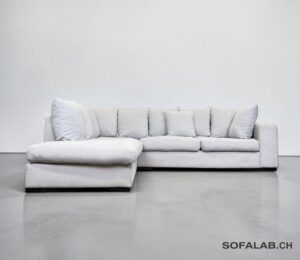 Corner Sofa made of light gray fabric, including all pillows – buy Occasion sofa at SofaLab